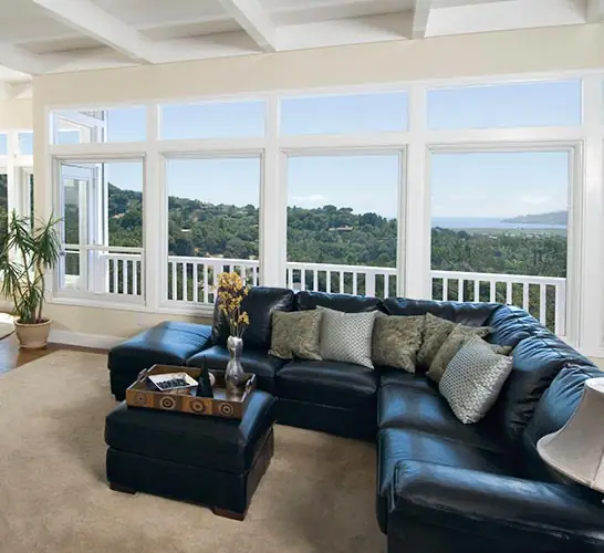 Sunroom filled with natural light after window replacement — the kind of work local partners deliver in Milford